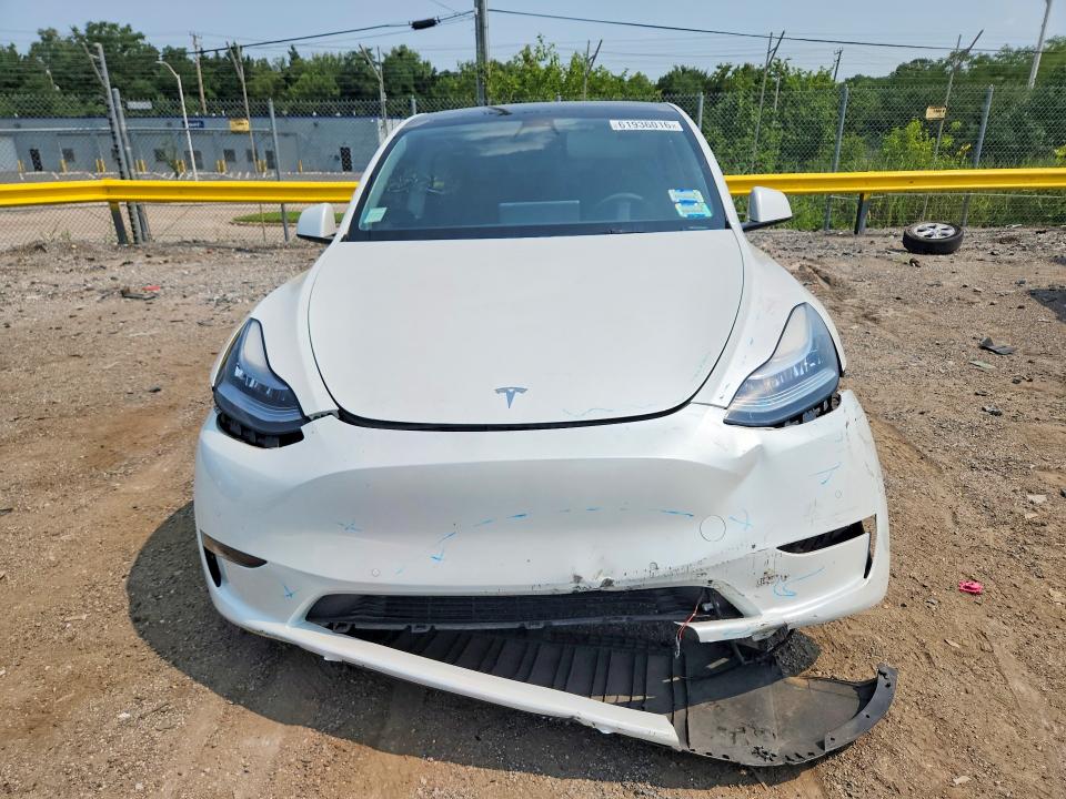 61936016 :رقم المزاد ، 5YJYGDEE9MF145202 vin ، 2021 Tesla Model Y مزاد بيع