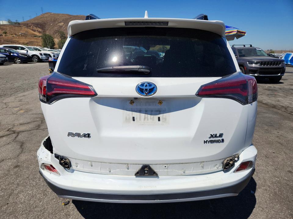 Продаж на аукціоні авто 2018 Toyota Rav4 Hybrid, vin: JTMRJREV0JD179860, номер лоту: 63385336