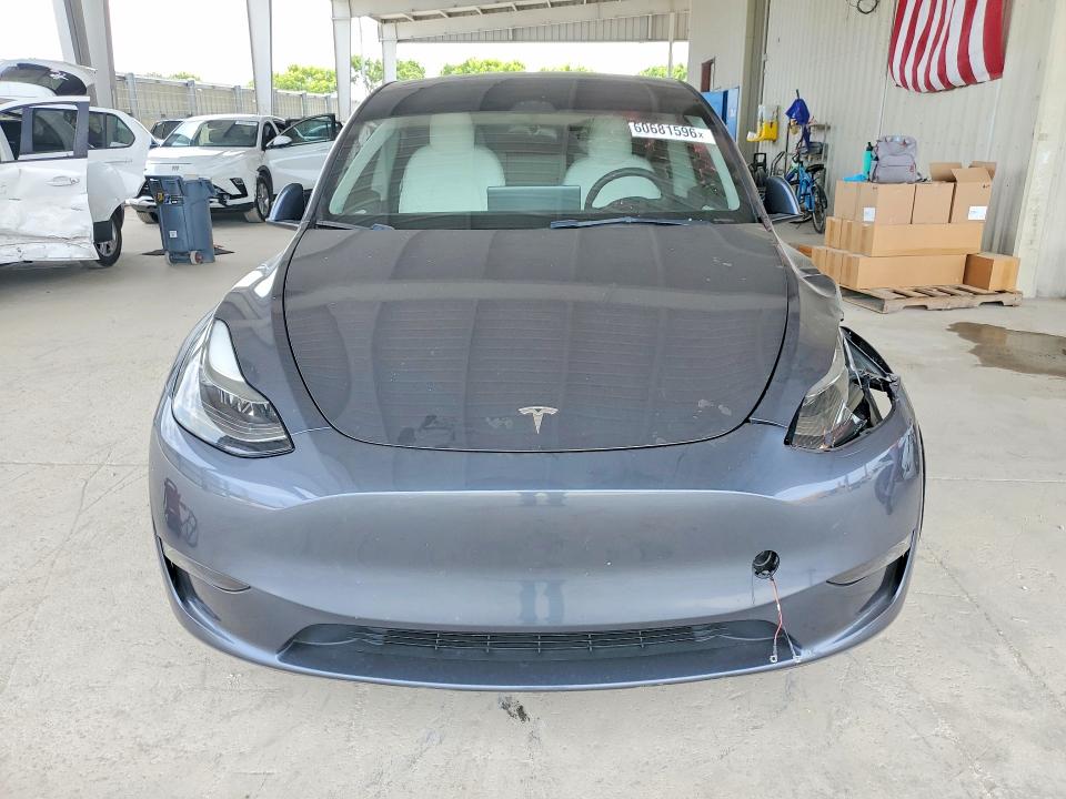 60681596 :رقم المزاد ، 7SAYGAEE1PF662788 vin ، 2023 Tesla Model Y مزاد بيع