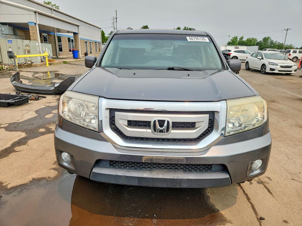 60795126 :رقم المزاد ، 5FNYF4H76BB063375 vin ، 2011 Honda Pilot مزاد بيع