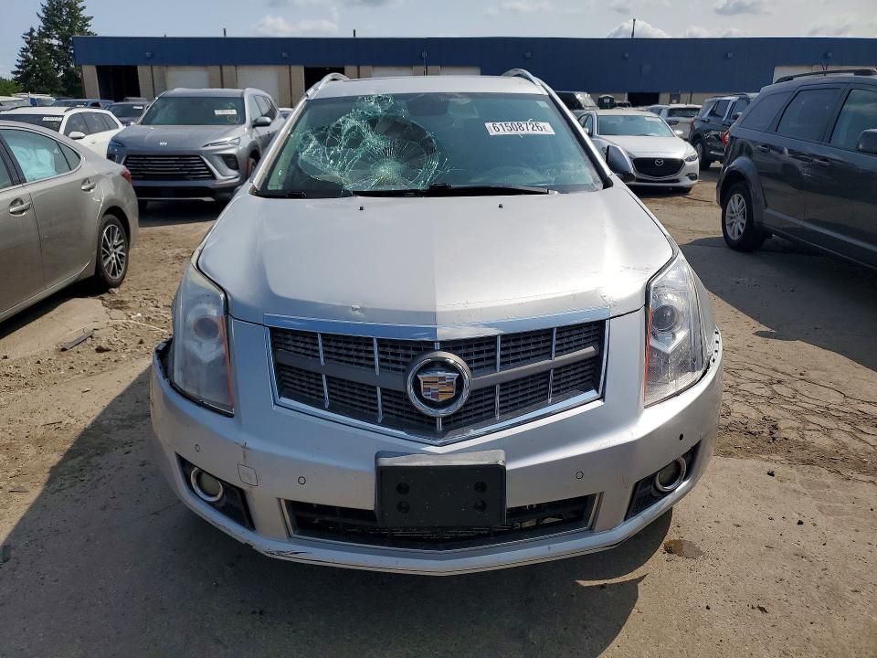 61508726 :رقم المزاد ، 3GYFNEEY9AS588198 vin ، 2010 Cadillac Srx مزاد بيع