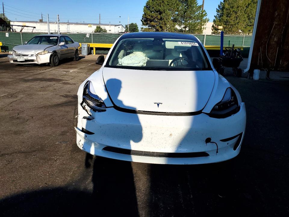 Продажа на аукционе авто 2018 Tesla Model 3, vin: 5YJ3E1EBXJF081400, номер лота: 61976656