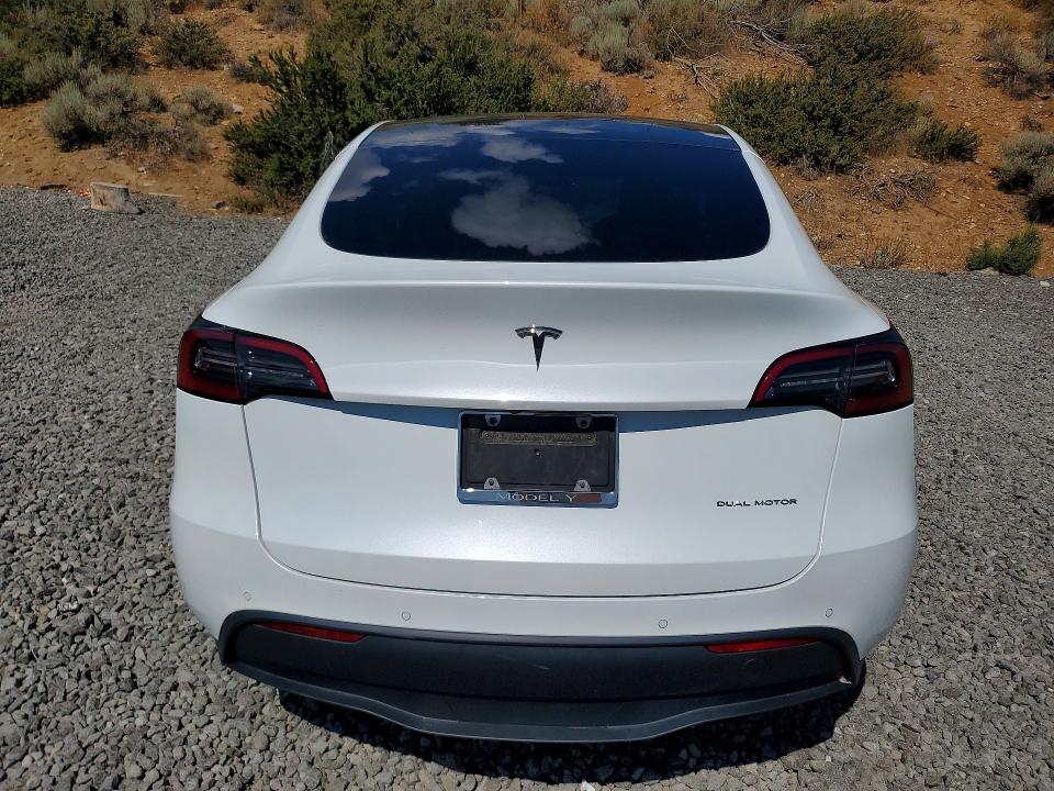 60811126 :رقم المزاد ، 5YJYGDEE4MF207119 vin ، 2021 Tesla Model Y مزاد بيع