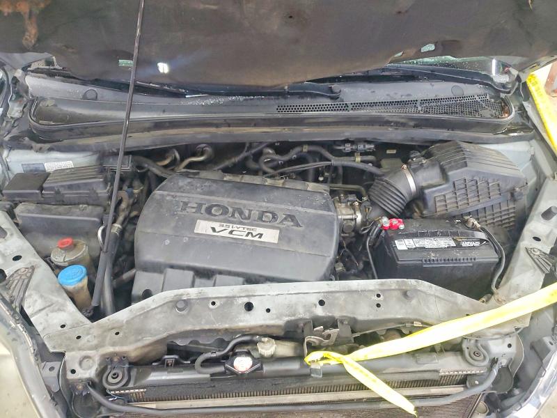 60660556 :رقم المزاد ، 5FNRL38857B027068 vin ، 2007 Honda Odyssey مزاد بيع