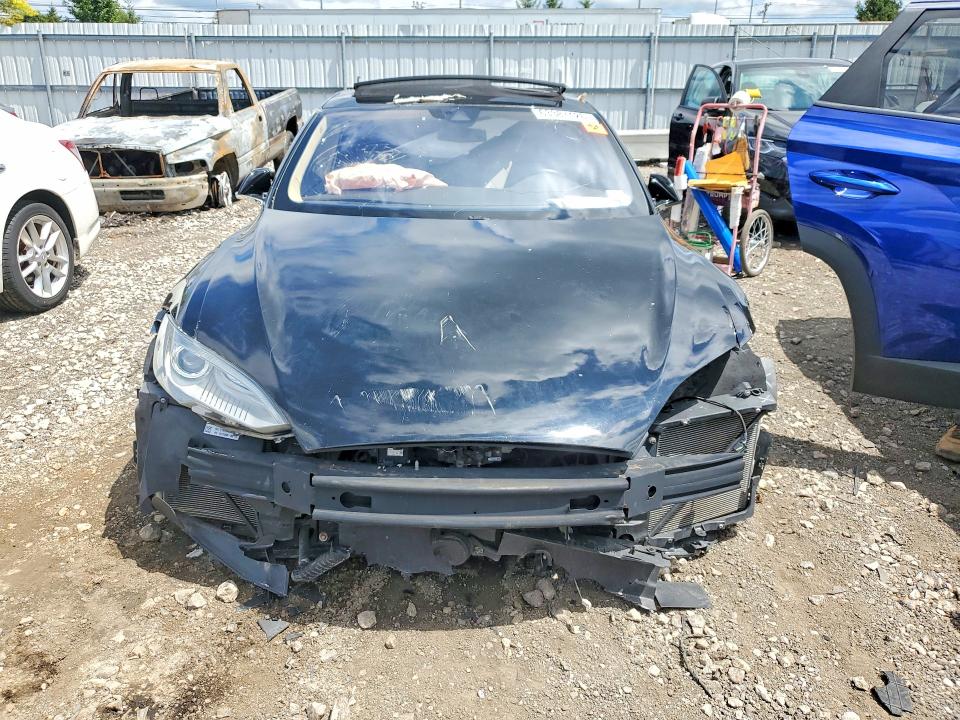 Продажа на аукционе авто 2015 Tesla Model S, vin: 5YJSA1E20FF106612, номер лота: 63387426