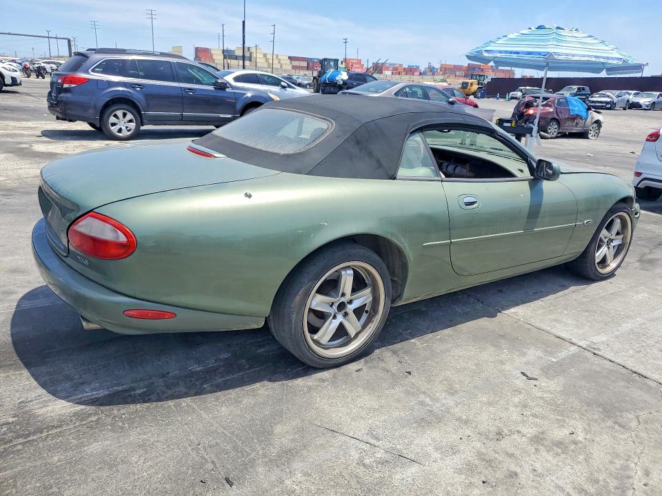 62526426 :رقم المزاد ، SAJGX2041XC039599 vin ، 1999 Jaguar Xk8 مزاد بيع