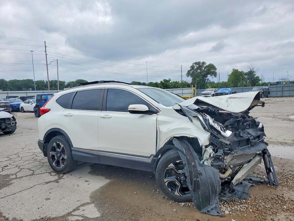 63506326 :رقم المزاد ، 2HKRW2H99HH100648 vin ، 2017 Honda Cr-v مزاد بيع