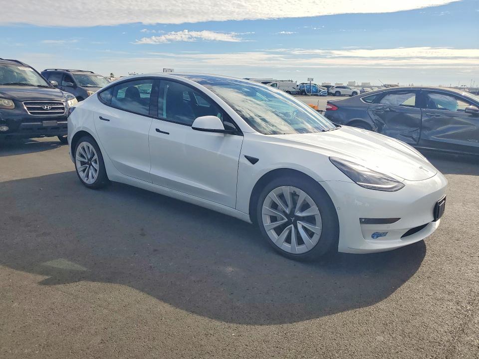 62076966 :رقم المزاد ، 5YJ3E1EB2MF863064 vin ، 2021 Tesla Model 3 مزاد بيع