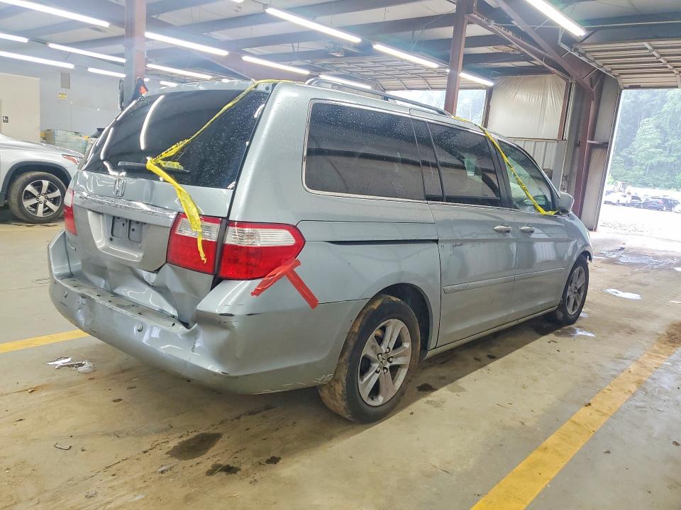 60660556 :رقم المزاد ، 5FNRL38857B027068 vin ، 2007 Honda Odyssey مزاد بيع