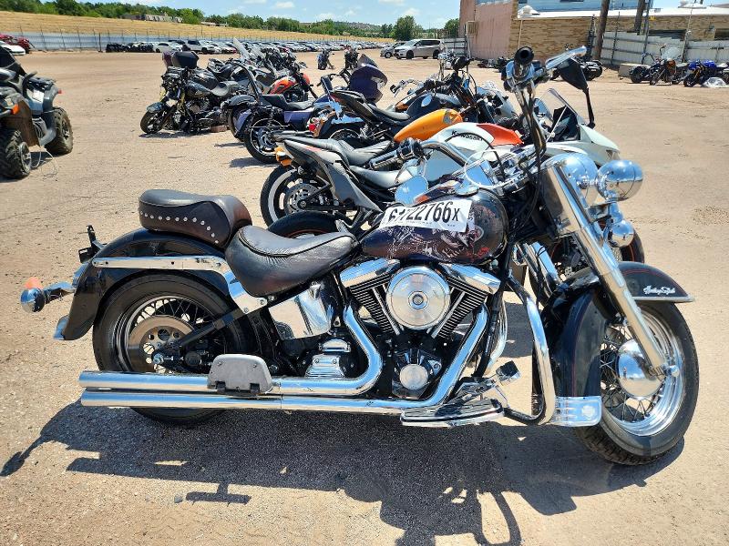 61722766 :رقم المزاد ، 1HD1BJL48XY041442 vin ، 1999 Harley-davidson Flstc مزاد بيع