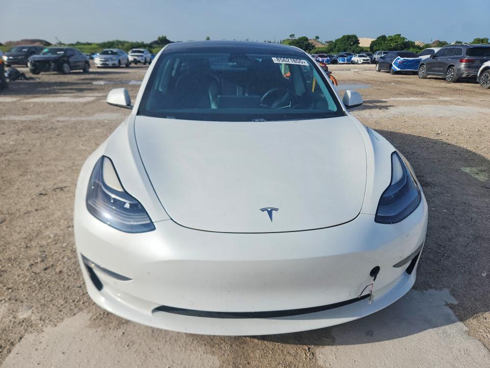 Продаж на аукціоні авто 2021 Tesla Model 3, vin: 5YJ3E1EBXMF915038, номер лоту: 85621855