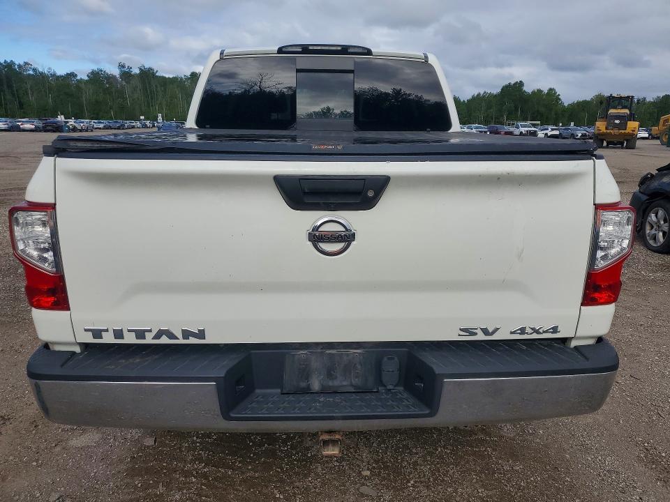 61354156 :رقم المزاد ، 1N6AA1EJ6JN528491 vin ، 2018 Nissan Titan مزاد بيع