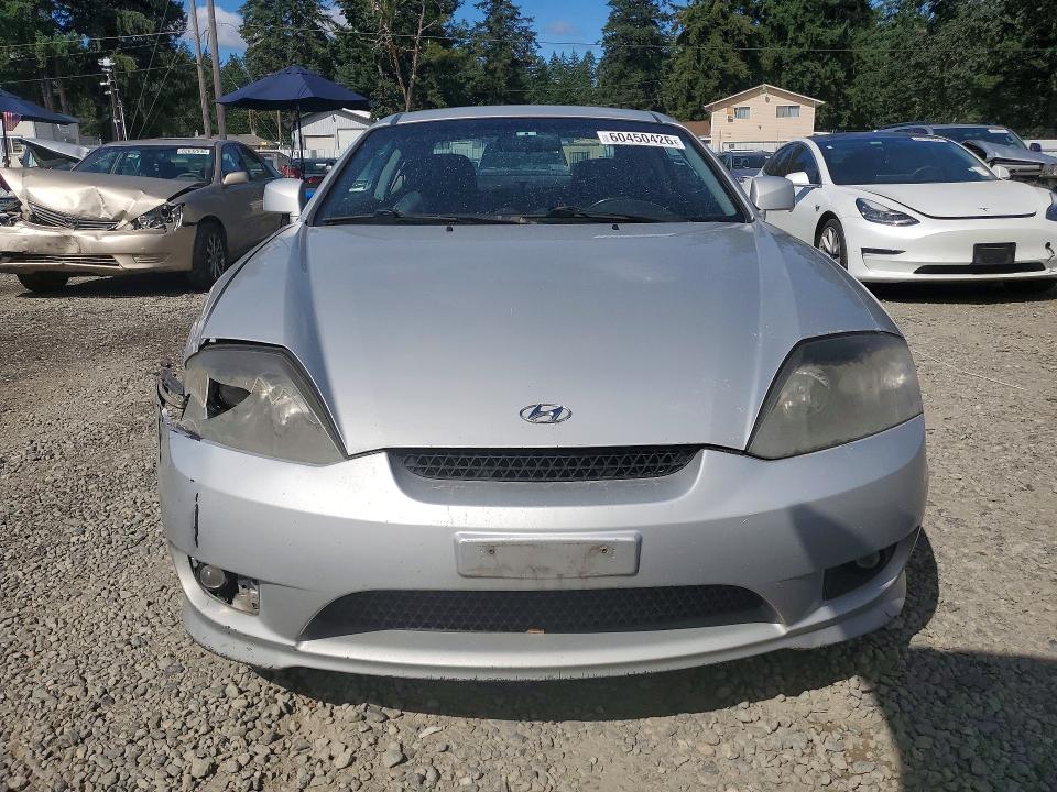 2005 Hyundai Tiburon მანქანა იყიდება აუქციონზე, vin: KMHHN65F65U181007, აუქციონის ნომერი: 60450426