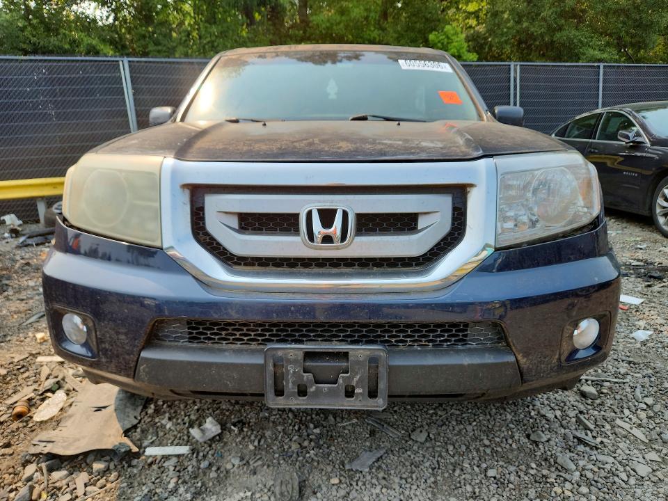 60556306 :رقم المزاد ، 5FNYF4H47BB083642 vin ، 2011 Honda Pilot مزاد بيع