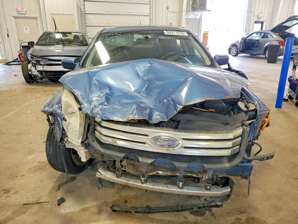 59971916 :رقم المزاد ، 3FAHP08169R153481 vin ، 2009 Ford Fusion مزاد بيع