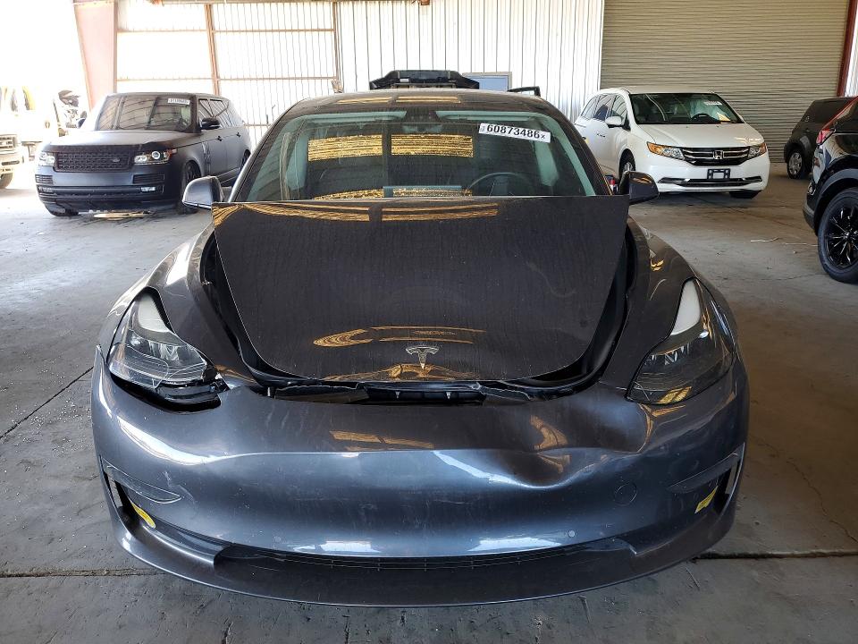 2022 Tesla Model 3 მანქანა იყიდება აუქციონზე, vin: 5YJ3E1EA0NF155176, აუქციონის ნომერი: 60873486