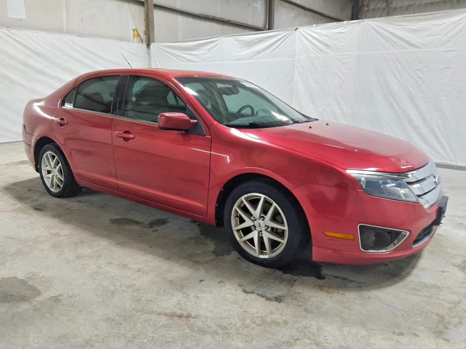 60390706 :رقم المزاد ، 3FAHP0JA2AR381203 vin ، 2010 Ford Fusion مزاد بيع