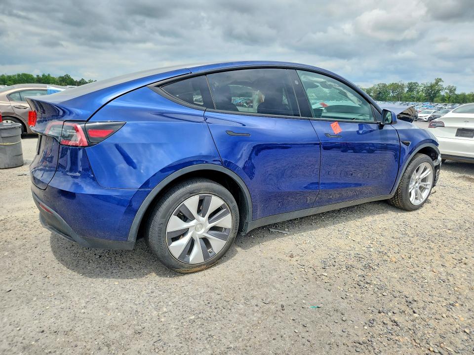 60064996 :رقم المزاد ، 7SAYGDED9PF945707 vin ، 2023 Tesla Model Y مزاد بيع