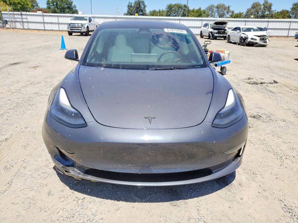 Продажа на аукционе авто 2023 Tesla Model 3, vin: 5YJ3E1EA3PF655593, номер лота: 61879406