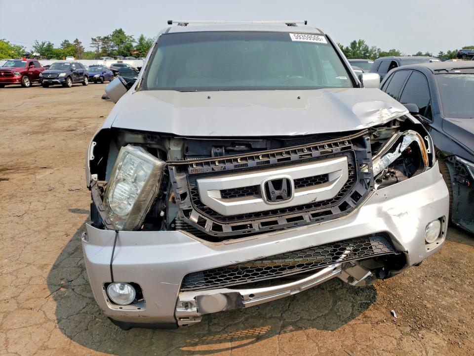 59359506 :رقم المزاد ، 5FNYF4H57BB046468 vin ، 2011 Honda Pilot مزاد بيع