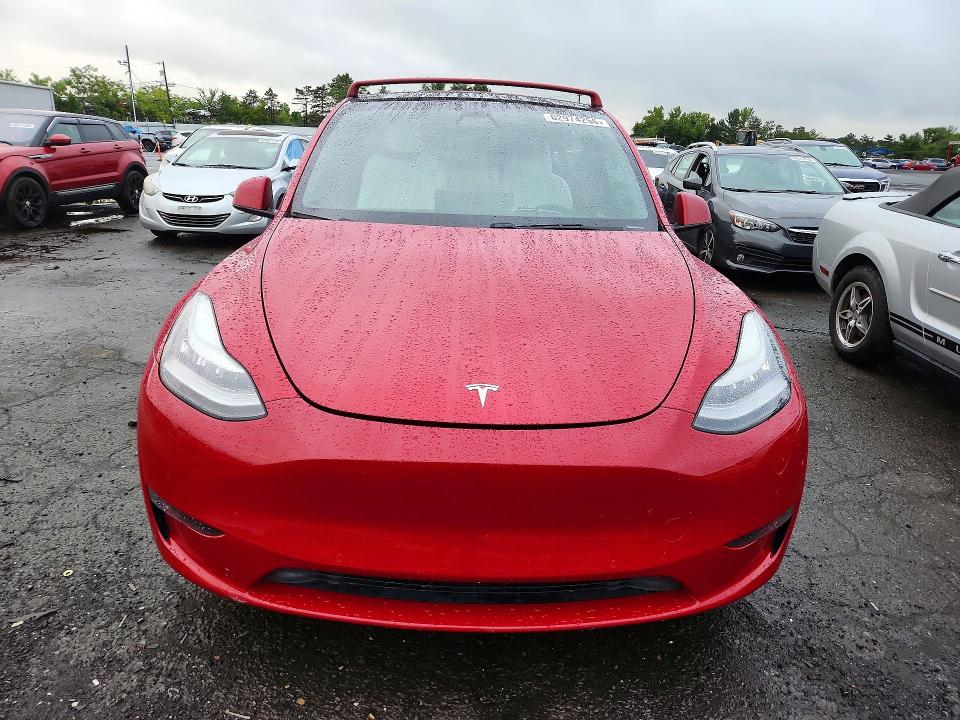 62974256 :رقم المزاد ، 5YJYGDEE4MF061403 vin ، 2021 Tesla Model Y مزاد بيع