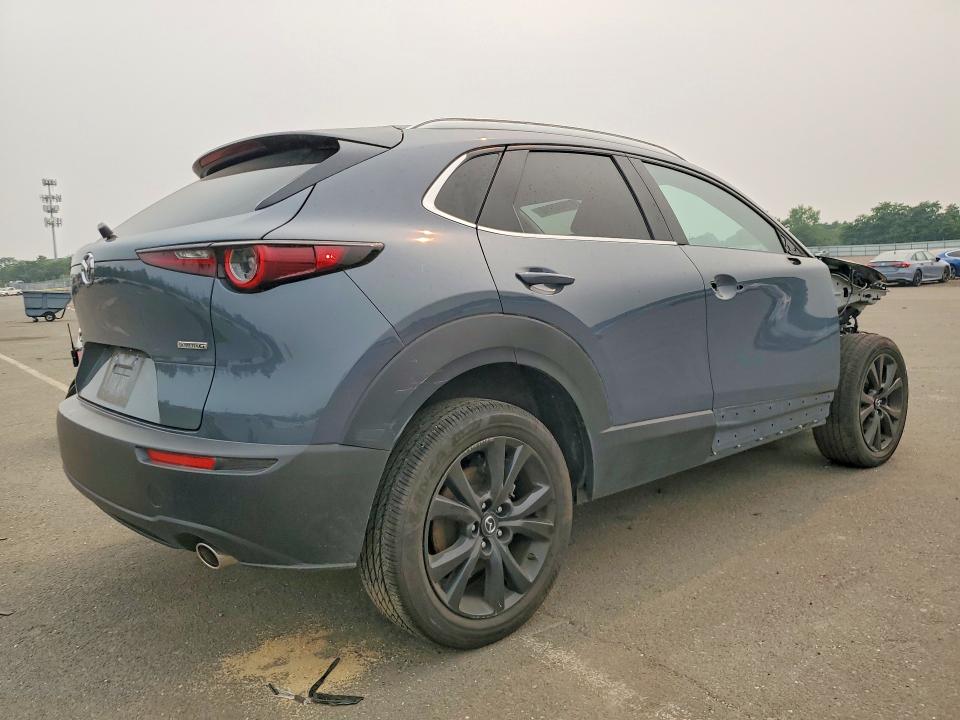 61030016 :رقم المزاد ، 3MVDMBCM7PM569451 vin ، 2023 Mazda Cx-30 مزاد بيع