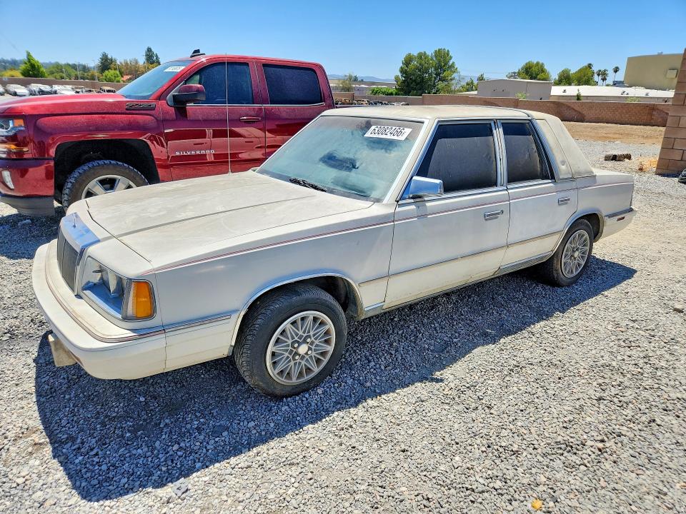1987 Chrysler Lebaron მანქანა იყიდება აუქციონზე, vin: 1C3BC56D7HF168495, აუქციონის ნომერი: 63082466