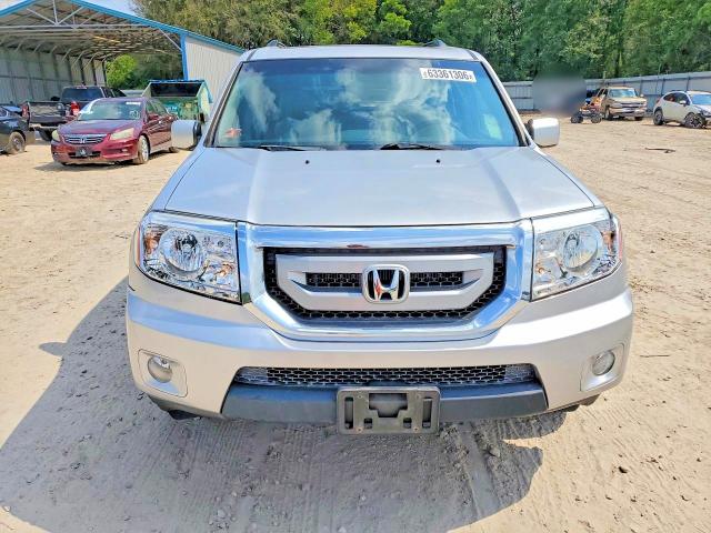 63361306 :رقم المزاد ، 5FNYF4H57BB075937 vin ، 2011 Honda Pilot مزاد بيع
