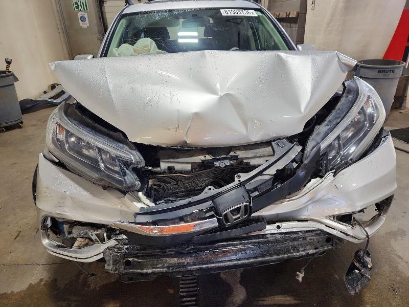 61905736 :رقم المزاد ، 2HKRM4H57GH640478 vin ، 2016 Honda Cr-v مزاد بيع