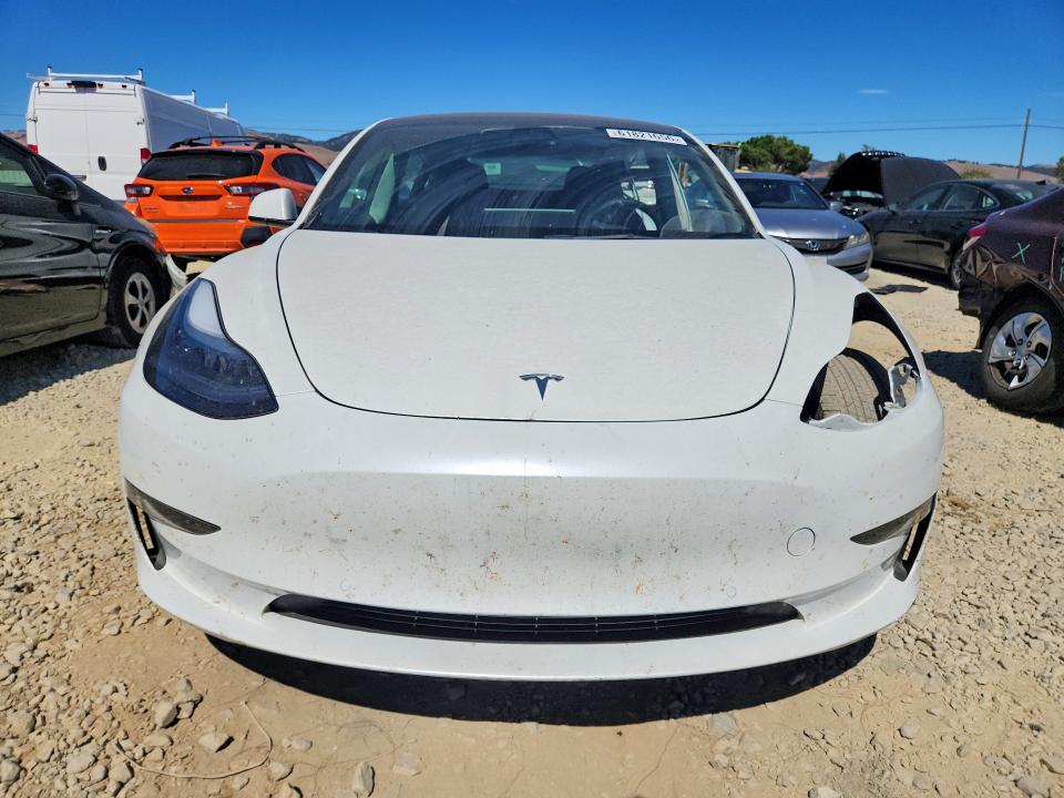 Продажа на аукционе авто 2022 Tesla Model 3, vin: 5YJ3E1EAXNF122864, номер лота: 61821656