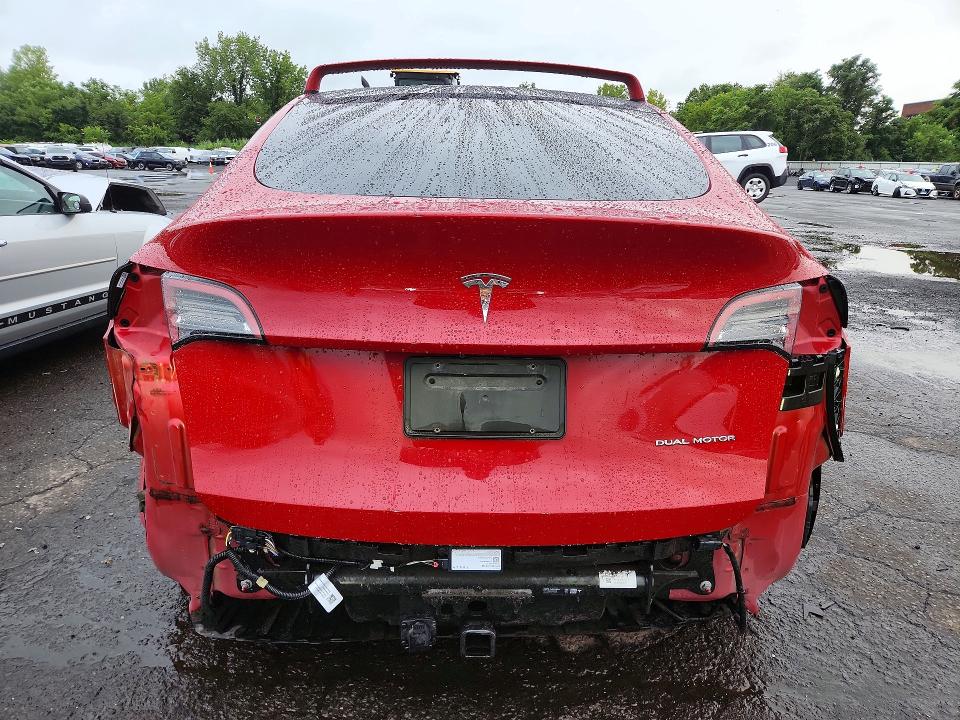 62974256 :رقم المزاد ، 5YJYGDEE4MF061403 vin ، 2021 Tesla Model Y مزاد بيع