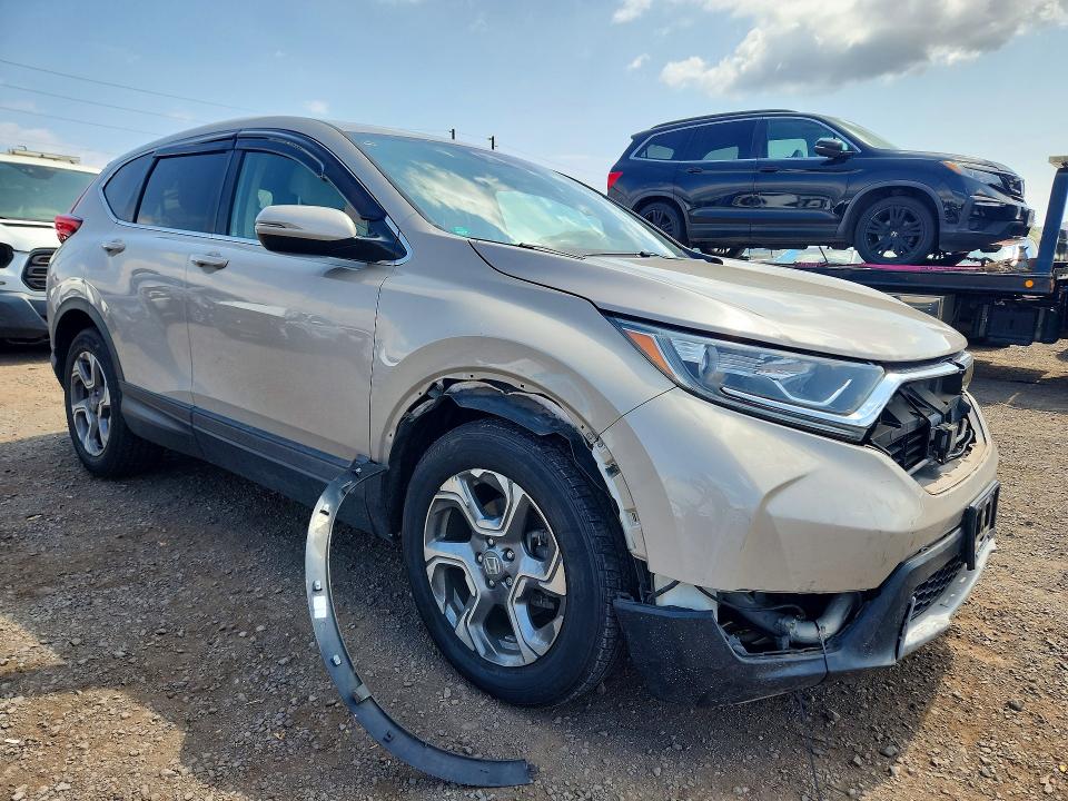 Auction sale of the 2018 Honda Cr-v, vin: 2HKRW2H52JH665343, lot number: 63043456