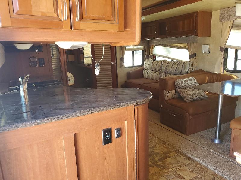 60432736 :رقم المزاد ، 4X4FWCH25CV025705 vin ، 2012 Forest River Wildcat 40' مزاد بيع