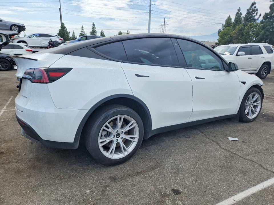 60875256 :رقم المزاد ، 7SAYGDEEXPA104968 vin ، 2023 Tesla Model Y مزاد بيع