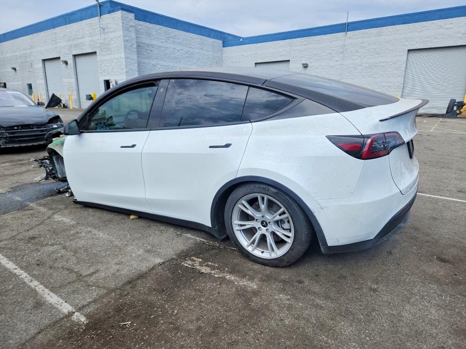 60875256 :رقم المزاد ، 7SAYGDEEXPA104968 vin ، 2023 Tesla Model Y مزاد بيع