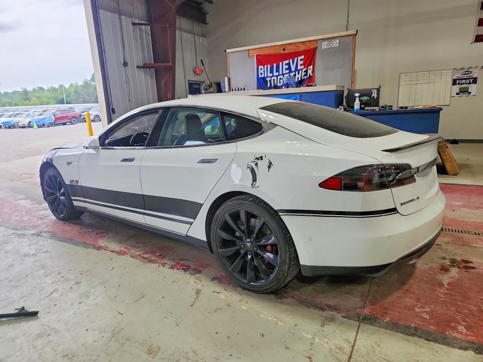 Продажа на аукционе авто 2014 Tesla Model S, vin: 5YJSA1H25EFP64856, номер лота: 61404756