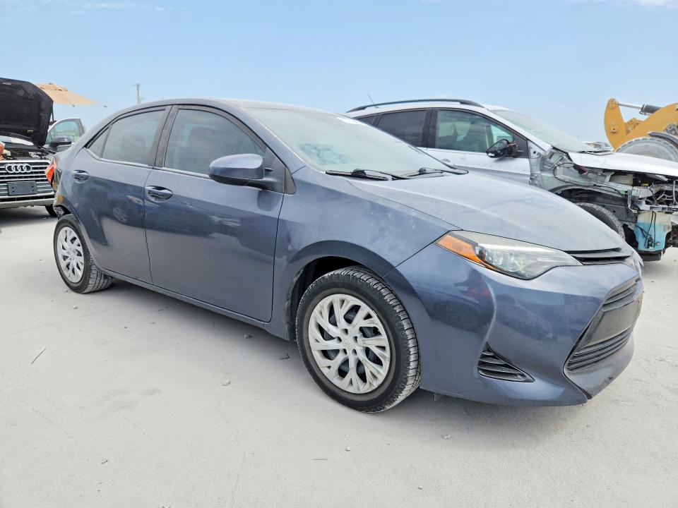 62979406 :رقم المزاد ، 5YFBURHE9KP859498 vin ، 2019 Toyota Corolla مزاد بيع