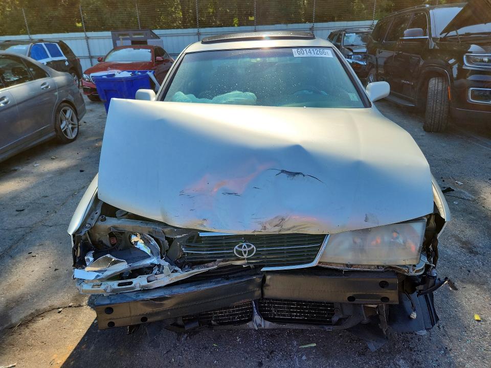 60141266 :رقم المزاد ، 4T1BF18B8XU332883 vin ، 1999 Toyota Avalon مزاد بيع