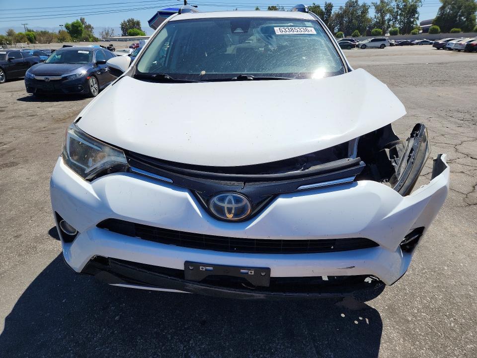 Продаж на аукціоні авто 2018 Toyota Rav4 Hybrid, vin: JTMRJREV0JD179860, номер лоту: 63385336