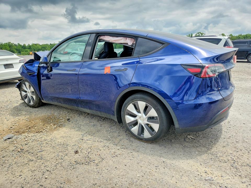 60064996 :رقم المزاد ، 7SAYGDED9PF945707 vin ، 2023 Tesla Model Y مزاد بيع