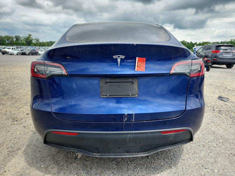 60064996 :رقم المزاد ، 7SAYGDED9PF945707 vin ، 2023 Tesla Model Y مزاد بيع