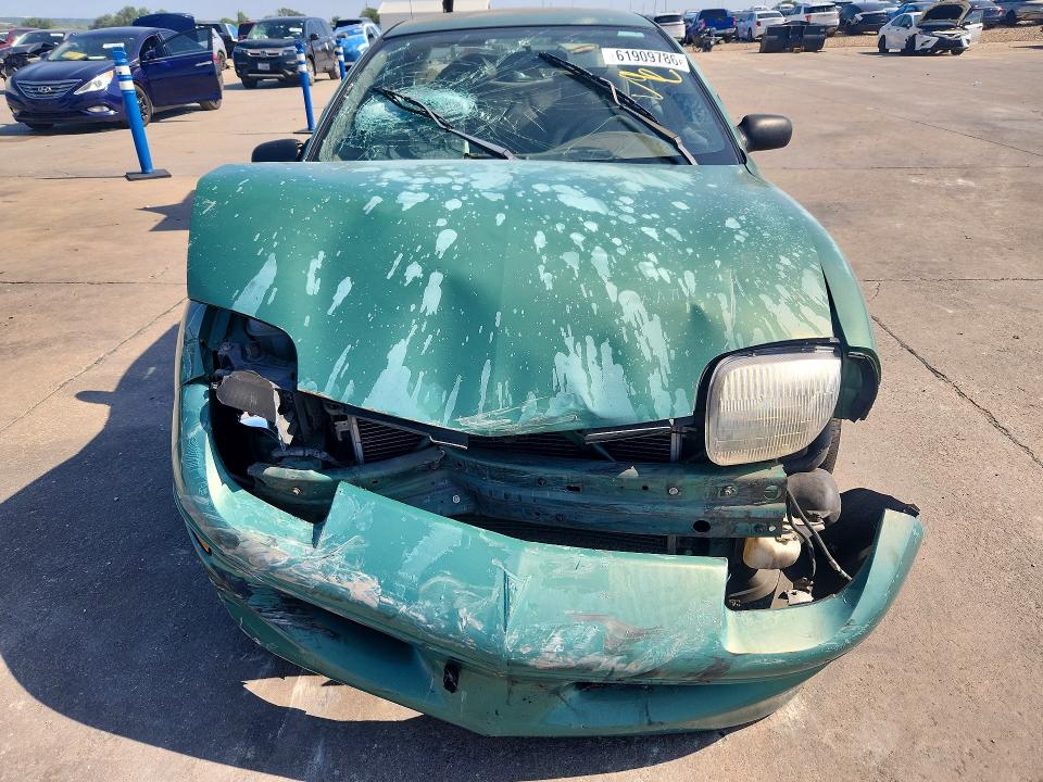 61909786 :رقم المزاد ، 3G2JB5241XS801944 vin ، 1999 Pontiac Sunfire مزاد بيع