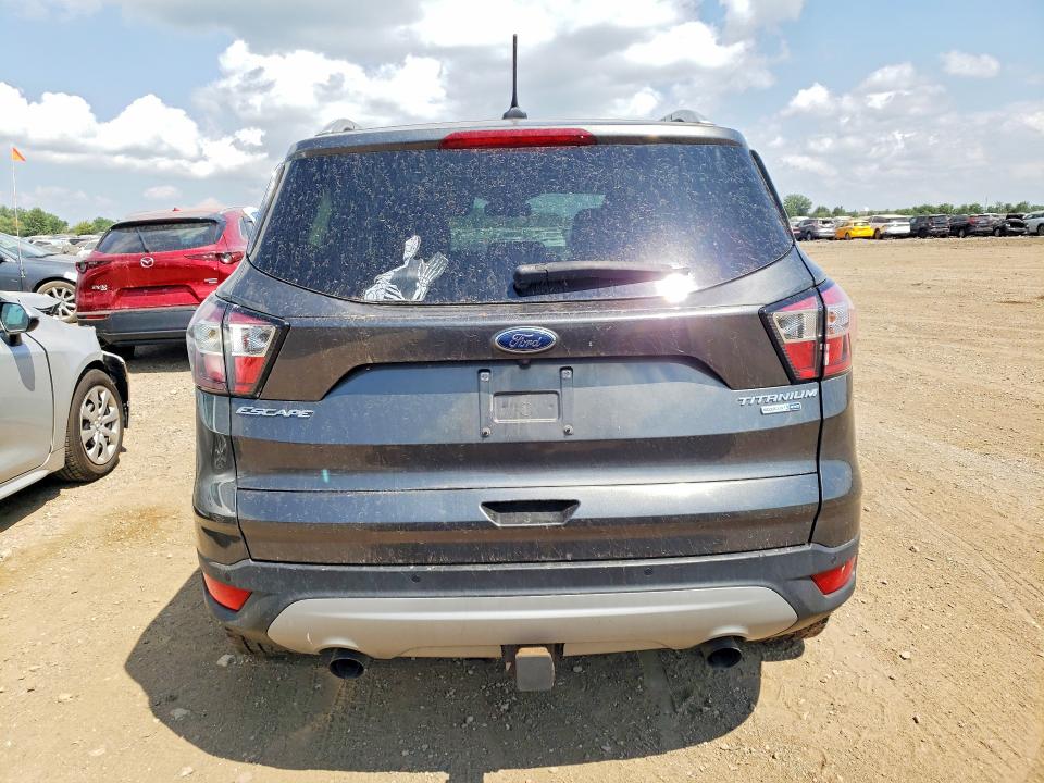 Auction sale of the 2018 Ford Escape, vin: 1FMCU9J9XJUA80593, lot number: 60115996