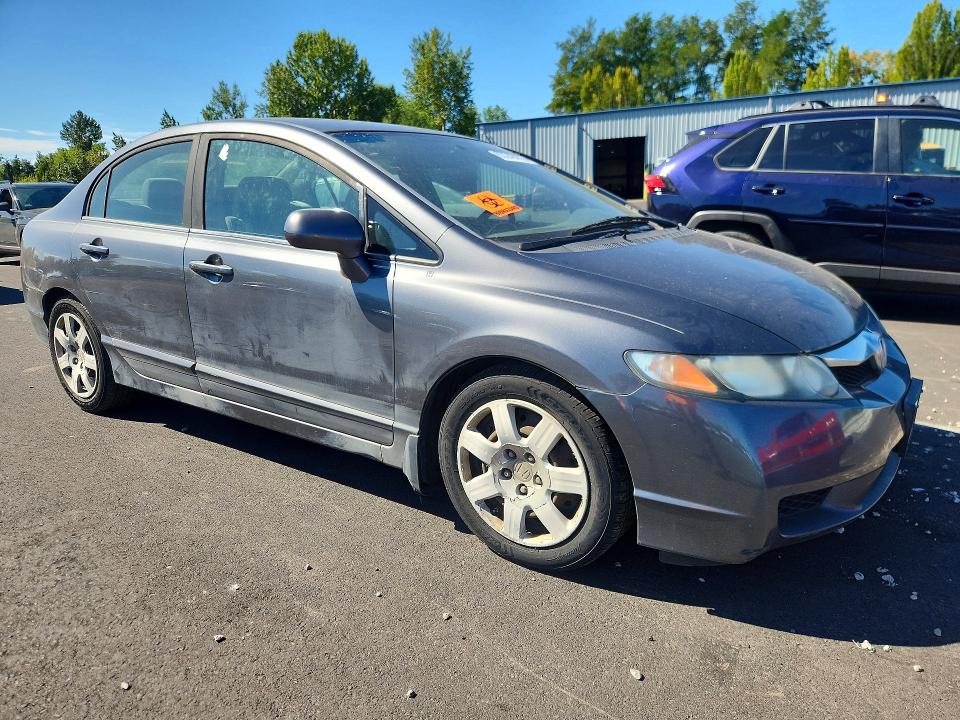 63248476 :رقم المزاد ، 19XFA1F58BE021348 vin ، 2011 Honda Civic مزاد بيع
