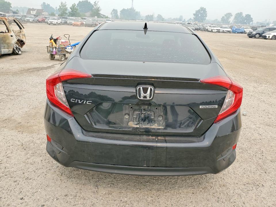 61010566 :رقم المزاد ، 2HGFC1F99JH104434 vin ، 2018 Honda Civic مزاد بيع