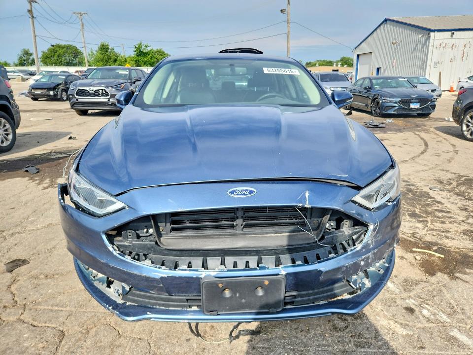 63285616 :رقم المزاد ، 3FA6P0PU9JR105772 vin ، 2018 Ford Fusion مزاد بيع