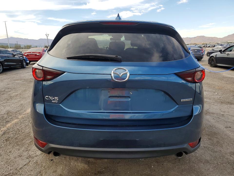 60977096 :رقم المزاد ، JM3KFBCMXM0441584 vin ، 2021 Mazda Cx-5 مزاد بيع