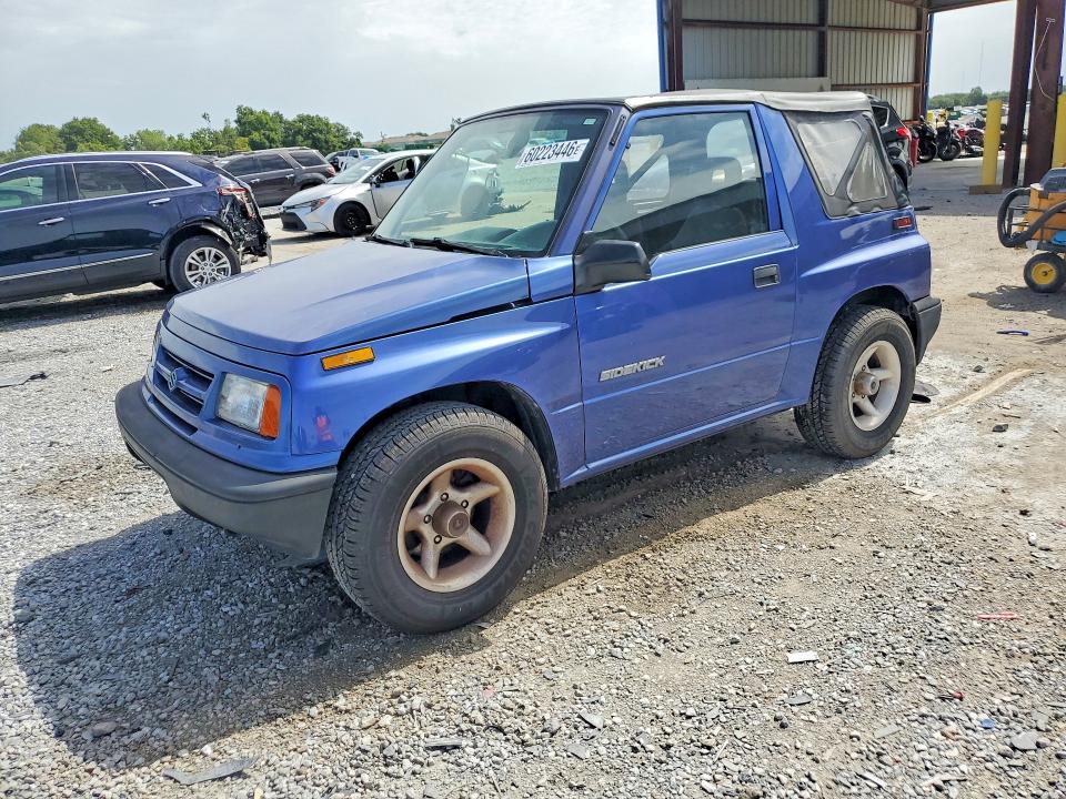 1997 Suzuki Sidekick მანქანა იყიდება აუქციონზე, vin: 2S3TC02C1V6400984, აუქციონის ნომერი: 60223446