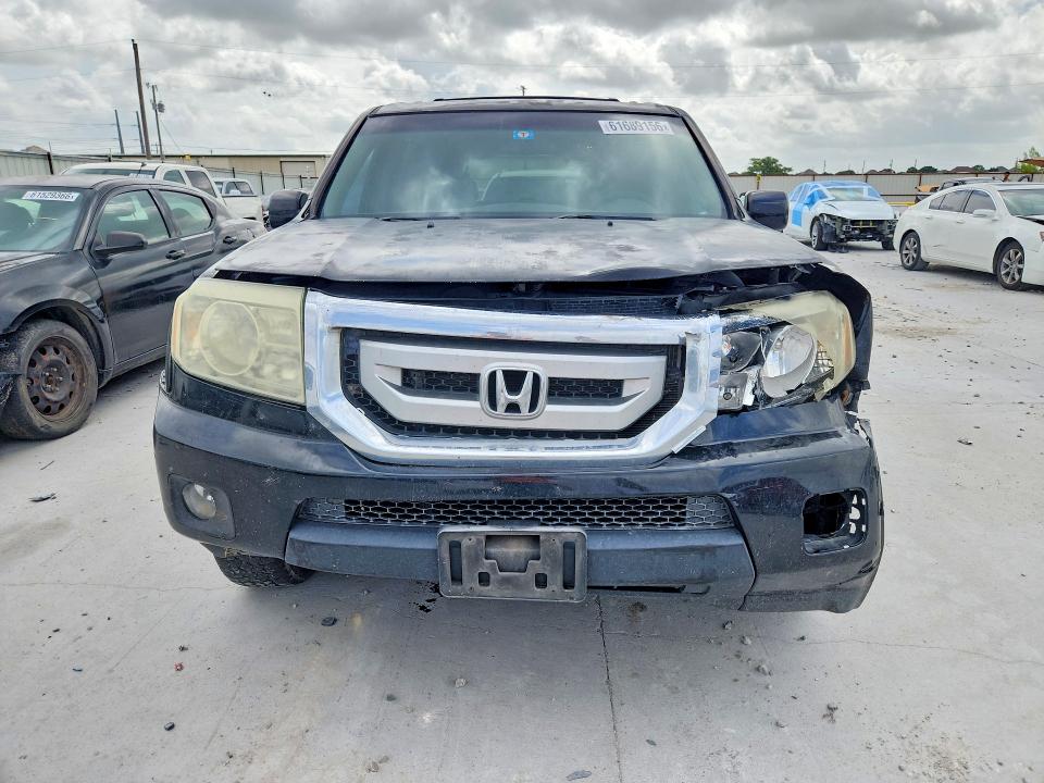 61689156 :رقم المزاد ، 5FNYF3H46BB007520 vin ، 2011 Honda Pilot مزاد بيع