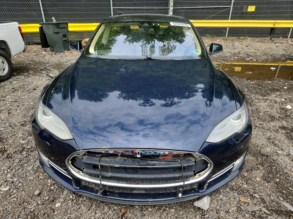 Продажа на аукционе авто 2014 Tesla Model S, vin: 5YJSA1H2XEFP64187, номер лота: 62940406